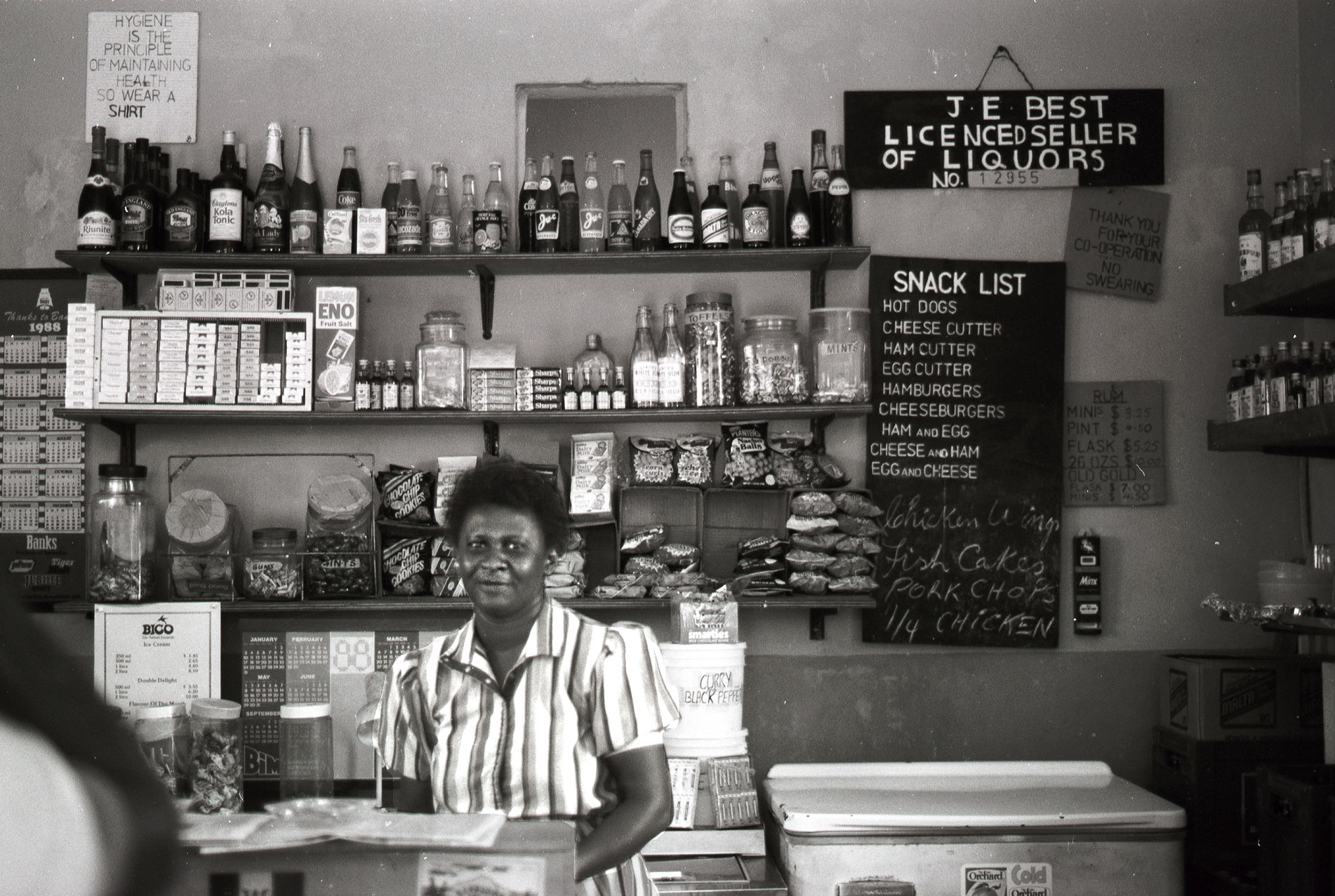 A roadside cafe and owner in Barbados, 1988.