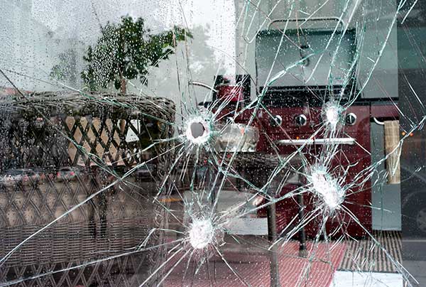 A department store window after a peaceful street protest turned violent in Oakland, California, in 2010.