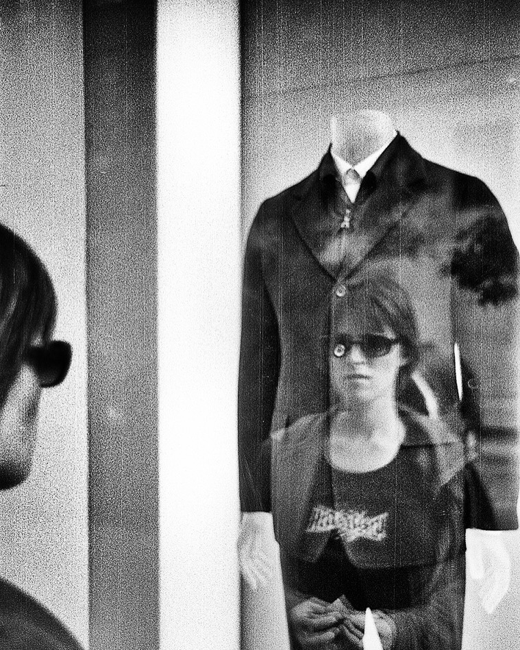 A woman looked at her reflection in a New York store window in 2003.