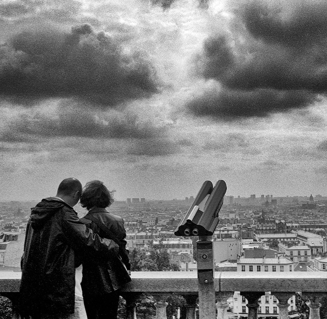 A couple admired the view of Paris from the Sacre Couer in Montmartre, 2002.