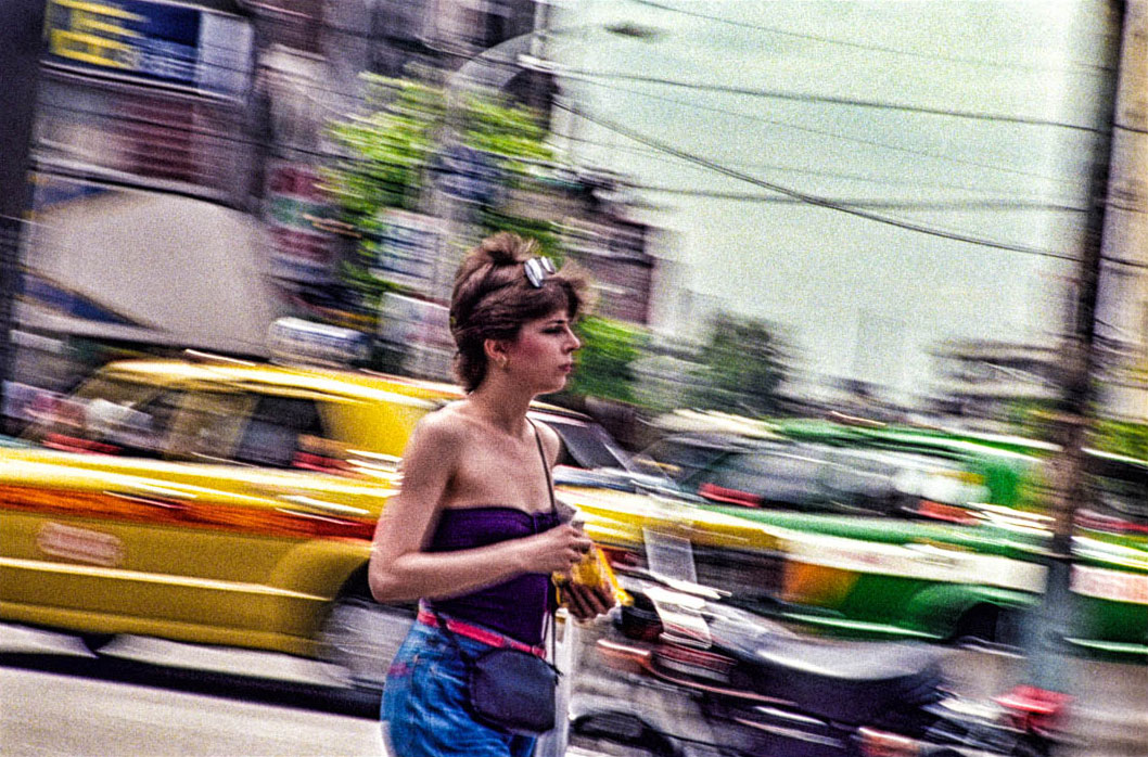 A young woman calmly walked along a bustling Tokyo avenue in 1980.