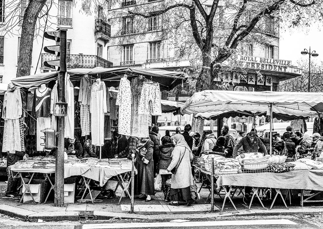 A twice weekly street market in the Belleville neighborhood in Paris.