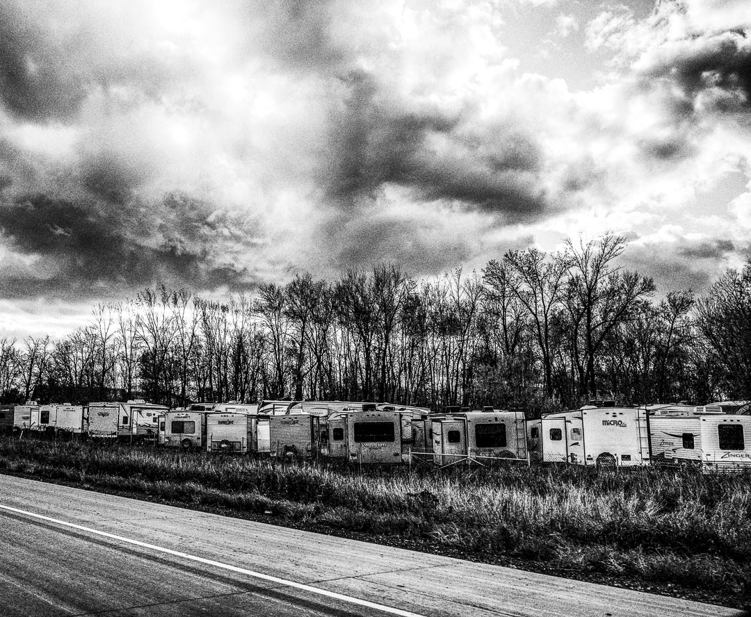 Old camping trailers in a Minnesota roadside field in 2018